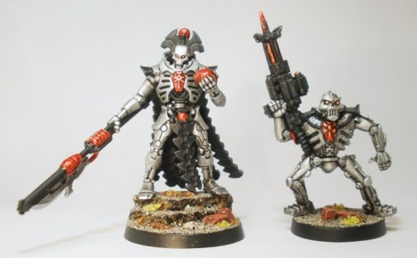 Lord Decimal rolls his optics at yet another report of botched plans by his second in command (an original metal GW Necron Warrior).