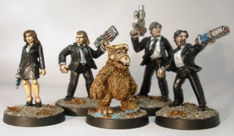 ALF avails of Earthside diplomatic immunity via some (slightly shiny) MiBs.