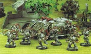 Sin Eaters Possessed cavort in front of familiar White Dwarf terrain of the era.