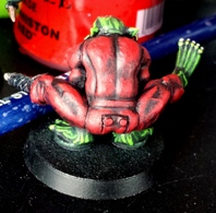 I forgot to take a rear shot of Da Captive, so here is a shot of the butt-flap while the figure was on the painting table.