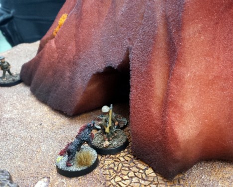 The Leprechan officer is ambushed by a Death Ferret while investigating a corpse.  However, products of Leprechan Officer School are not put off so easily...