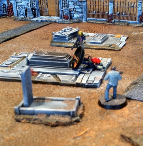 The fusillade of ork fire forces Agent Sophie to fall back from the zombies at the Southern energy source, although some canny maneuvering leads a zombies to blindly fall into an open grave and bach its brains out on a rock.