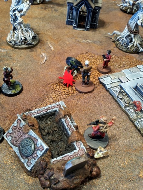 Aces arrival in support of the Lt. goes as might be expected - in a spray of zombie brains.