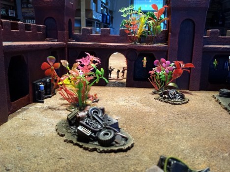 The Emissaries are rushing from the diagonally opposite corner of the battlefield to help the Inquisitor/disable the the power nodes.