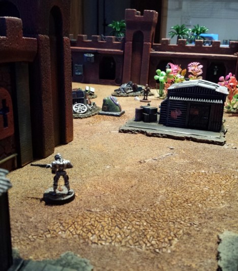 The Necron Mark 1 unit redeploys sightly to disrupt the Emissary advance.