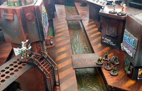 A running firefight begins between the gretchin and the cops...