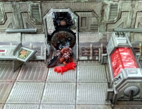 ...just in time to see the bloodied body of Max being hurled through the door by the roaring brutish form of Pig Iron.