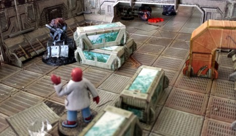 ...where the Decapodian is dismayed to find a toxic, part man, part industrial machinery armed with a syringe and a XXX bearing down on him. All hope is not lost however, as Freeway (visible in the top of the image) is busily ripping the throat from another Purgator trooper and on his way. Then again, so is Pig Iron