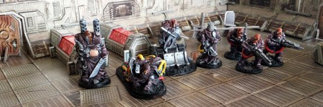 The Purgators. L to R: Codename: Pig Iron, Codename: Cypher (officer), Codename: Bull, Codename Holy Smoke, 3 x Purgator trooper.