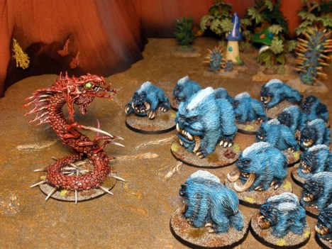 The larger males protect the herd from a predator.