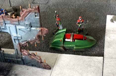 Sovs take cover behind an abandoned Foord hovercar.