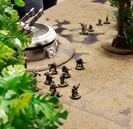 Genestealer cultists to the left of me, Space Santa and his ratling minions to the right...