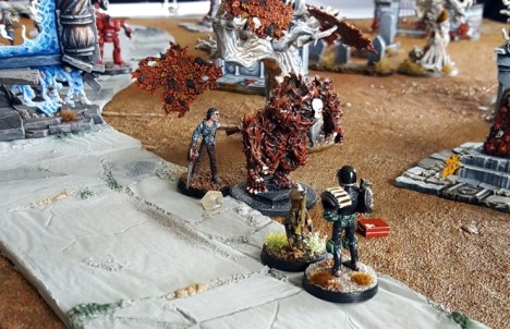 The Kabereoi Castellan robot immediately engages its auto-targeting systems on the learned chitinous gent as it closes on the Captain.